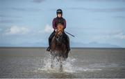 5 September 2017; Jack Blue, with Kate Harrington up, in the surf ahead of the Laytown Races at Laytown in Co Meath. Photo by Cody Glenn/Sportsfile