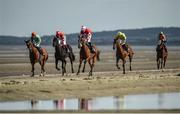 5 September 2017; Race horses and jockeys gallop to the start of the At The Races Handicap during the Laytown Races at Laytown in Co Meath. Photo by Cody Glenn/Sportsfile