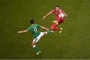 5 September 2017; Jagoš Vukovic of Serbia in action against Shane Long of Republic of Ireland during the FIFA World Cup Qualifier Group D match between Republic of Ireland and Serbia at the Aviva Stadium in Dublin. Photo by Stephen McCarthy/Sportsfile