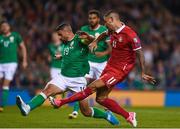 5 September 2017; Aleksandar Kolarov of Serbia shoots to score his side's first goal despite the attention of Jonathan Walters of Republic of Ireland during the FIFA World Cup Qualifier Group D match between Republic of Ireland and Serbia at the Aviva Stadium in Dublin. Photo by Seb Daly/Sportsfile