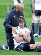 12 June 2012; Ireland's Andrew Trimble receives treatment from team doctor Dr. Eanna Falvey during squad training ahead of their Steinlager Series 2012, 2nd test, game against New Zealand on Saturday. Ireland Rugby Squad Training, Onewa Domain, Auckland, New Zealand. Picture credit: Ross Setford / SPORTSFILE
