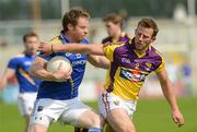 10 June 2012; Sean McCormack, Longford, in action against Niall Murphy, Wexford. Leinster GAA Football Senior Championship, Quarter-Final Replay, Longford v Wexford, O'Connor Park, Tullamore, Co. Offaly. Picture credit: Barry Cregg / SPORTSFILE