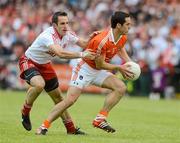 10 June 2012; Aaron Kernan, Armagh, in action against Mark Donnelly, Tyrone. Ulster GAA Football Senior Championship, Quarter-Final, Armagh v Tyrone, Morgan Athletic Grounds, Armagh. Picture credit: Brian Lawless / SPORTSFILE