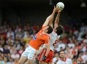 10 June 2012; Joe McMahon, Tyrone, in action against John Kingham, Armagh. Ulster GAA Football Senior Championship, Quarter-Final, Armagh v Tyrone, Morgan Athletic Grounds, Armagh. Picture credit: Brian Lawless / SPORTSFILE