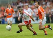 10 June 2012; Stephen O'Neill, Tyrone, in action against Ciaran McKeever, Armagh. Ulster GAA Football Senior Championship, Quarter-Final, Armagh v Tyrone, Morgan Athletic Grounds, Armagh. Picture credit: Brian Lawless / SPORTSFILE