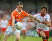 10 June 2012; Andy Mallon, Armagh, in action against Joe McMahon, Tyrone. Ulster GAA Football Senior Championship, Quarter-Final, Armagh v Tyrone, Morgan Athletic Grounds, Armagh. Picture credit: Brian Lawless / SPORTSFILE