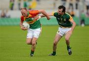 10 June 2012; Paul Reid, Carlow, in action against Shane McAnarney, Meath. Leinster GAA Football Senior Championship, Quarter-Final, Meath v Carlow, O'Connor Park, Tullamore, Co. Offaly. Picture credit: Barry Cregg / SPORTSFILE