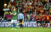 14 June 2012; A dejected Robbie Keane, Republic of Ireland, after Spain's Fernando Torres scored his side's first goal after four minutes. EURO2012, Group C, Spain v Republic of Ireland, Arena Gdansk, Gdansk, Poland. Picture credit: David Maher / SPORTSFILE