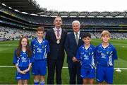 3 September 2017; Uachtarán Chumann Lúthchleas Gael Aogán Ó Fearghaíl, President of the INTO John Boyle with the children who carried out the cup and ball ahead of the GAA Hurling All-Ireland Senior Championship Final match between Galway and Waterford at Croke Park in Dublin. Photo by Daire Brennan/Sportsfile