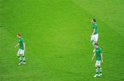 14 June 2012; A dejected Paul Green, John O'Shea and Stephen Ward, Republic of Ireland, at the end of the game. EURO2012, Group C, Spain v Republic of Ireland, Arena Gdansk, Gdansk, Poland. Picture credit: Pat Murphy / SPORTSFILE