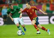 14 June 2012; Andres Iniesta, Spain, in action against Glenn Whelan, Republic of Ireland. EURO2012, Group C, Spain v Republic of Ireland, Arena Gdansk, Gdansk, Poland. Picture credit: David Maher / SPORTSFILE