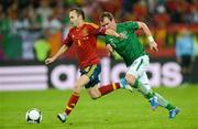 14 June 2012; Andres Iniesta, Spain, in action against Glenn Whelan, Republic of Ireland. EURO2012, Group C, Spain v Republic of Ireland, Arena Gdansk, Gdansk, Poland. Picture credit: David Maher / SPORTSFILE