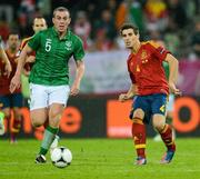 14 June 2012; Javi Martinez, Spain, in action against Richard Dunne, Republic of Ireland. EURO2012, Group C, Spain v Republic of Ireland, Arena Gdansk, Gdansk, Poland. Picture credit: David Maher / SPORTSFILE