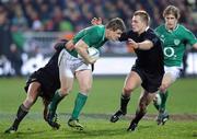 16 June 2012; Ireland's Brian O'Driscoll is tackled by New Zealand's Sam Cane and Dan Carter. Steinlager Series 2012, 2nd Test, New Zealand v Ireland, AMI Stadium, Christchurch, New Zealand. Picture credit: Ross Setford / SPORTSFILE