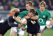 16 June 2012; Ireland's Brian O'Driscoll is tackled by New Zealand's Sam Cane and Dan Carter. Steinlager Series 2012, 2nd Test, New Zealand v Ireland, AMI Stadium, Christchurch, New Zealand. Picture credit: Ross Setford / SPORTSFILE