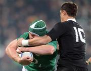 16 June 2012; Sean O'Brien, Ireland, is tackled by Dan Carter, New Zealand. Steinlager Series 2012, 2nd Test, New Zealand v Ireland, AMI Stadium, Christchurch, New Zealand. Picture credit: Ross Setford / SPORTSFILE