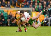16 June 2012; Eugene Scullion, Derry, in action against Patrick McBrearty, Donegal. Ulster GAA Football Senior Championship Quarter-Final, Donegal v Derry, MacCumhaill Park, Ballybofey, Co. Donegal. Picture credit: Oliver McVeigh / SPORTSFILE