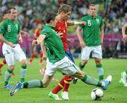14 June 2012; Fernando Torres, Spain, in action against Stephen Ward, Republic of Ireland. EURO2012, Group C, Spain v Republic of Ireland, Arena Gdansk, Gdansk, Poland. Picture credit: Pat Murphy / SPORTSFILE