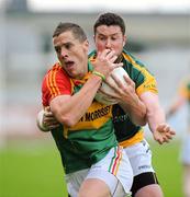 16 June 2012; Brendan Murphy, Carlow, in action against Cian Ward, Meath. Leinster GAA Football Senior Championship Quarter-Final Replay, Meath v Carlow, O'Connor Park, Tullamore, Co Offaly. Picture credit: Matt Browne / SPORTSFILE