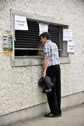 17 June 2012; A spectator purchases a match ticket before the game. Leinster GAA Football Senior Championship Quarter-Final, Offaly v Kildare, O'Moore Park, Portlaoise, Co. Laois. Picture credit: Barry Cregg / SPORTSFILE