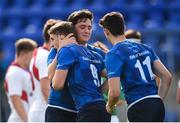 9 September 2017; Cormac Foley of Leinster, center, is congratulated by team-mate Niall McEniff and Ruairi Shields, right, after scoring his side's second try during the U19 Interprovincial Series match between Leinster and Ulster at Donnybrook Stadium in Dublin. Photo by Cody Glenn/Sportsfile