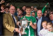 9 September 2017; Limerick captain Tom Morrissey is presented with The James Nowlan Cup by Uachtarán Tofa Chumann Lúthchleas Gael John Horan, left, and Dave Kirwan, CEO Bord Gáis Energy, after the Bord Gáis Energy GAA Hurling All-Ireland U21 Championship Final match between Kilkenny and Limerick at Semple Stadium in Thurles, Co Tipperary. Photo by Piaras Ó Mídheach/Sportsfile