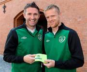 17 June 2012; Republic of Ireland's Damien Duff, right, is handed the captain's armband by Robbie Keane to mark his 100th cap for his country ahead of their side's UEFA EURO 2012, Group C, game against Italy on Monday. City Park Hotel, Poznan, Poland. Picture credit: David Maher / SPORTSFILE