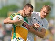 17 June 2012; Ken Casey, Offaly, in action against Peter Kelly, Kildare. Leinster GAA Football Senior Championship Quarter-Final, Offaly v Kildare, O'Moore Park, Portlaoise, Co. Laois. Picture credit: Barry Cregg / SPORTSFILE