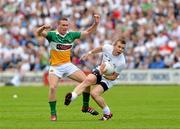 17 June 2012; Morgan O'Flaherty, Kildare, in action against Anton Sullivan, Offaly. Leinster GAA Football Senior Championship Quarter-Final, Offaly v Kildare, O'Moore Park, Portlaoise, Co. Laois. Picture credit: Barry Cregg / SPORTSFILE