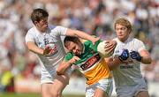 17 June 2012; Shane Sullivan, Offaly, in action against Padraig Fogarty, left, and Tomás O'Connor, Kildare. Leinster GAA Football Senior Championship Quarter-Final, Offaly v Kildare, O'Moore Park, Portlaoise, Co. Laois. Picture credit: Barry Cregg / SPORTSFILE