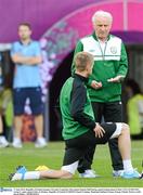 17 June 2012; Republic of Ireland manager Giovanni Trapattoni with captain Damien Duff during squad training ahead of their UEFA EURO 2012, Group C, game against Italy on Monday. Republic of Ireland EURO2012 Squad Training, Municipal Stadium Poznan, Poznan, Poland. Picture credit: David Maher / SPORTSFILE