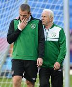 17 June 2012; Republic of Ireland manager Giovanni Trapattoni with Richard Dunne, during squad training ahead of their UEFA EURO 2012, Group C, game against Italy on Monday. Republic of Ireland EURO2012 Squad Training, Municipal Stadium Poznan, Poznan, Poland. Picture credit: David Maher / SPORTSFILE