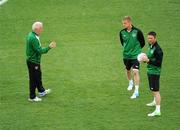 17 June 2012; Republic of Ireland manager Giovanni Trapattoni with Damien Duff, who will be captain when he wins his 100th cap against Italy, centre, and Robbie Keane during squad training ahead of their UEFA EURO 2012, Group C, game against Italy on Monday. Republic of Ireland EURO2012 Squad Training, Municipal Stadium Poznan, Poznan, Poland. Picture credit: Pat Murphy / SPORTSFILE