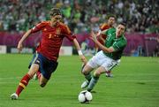 14 June 2012; Fernando Torres, Spain, goes past Stephen Ward, Republic of Ireland, on his way to scoring his side's first goal. EURO2012, Group C, Spain v Republic of Ireland, Arena Gdansk, Gdansk, Poland. Picture credit: Pat Murphy / SPORTSFILE
