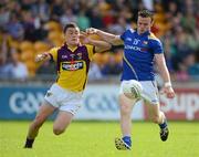 10 June 2012; Donal McElligott, Longford, in action against Lee Chin, Wexford. Leinster GAA Football Senior Championship, Quarter-Final Replay, Longford v Wexford, O'Connor Park, Tullamore, Co. Offaly. Picture credit: Matt Browne / SPORTSFILE