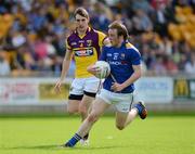 10 June 2012; Padraig McCormack, Longford, in action against Rob Tierney, Wexford. Leinster GAA Football Senior Championship, Quarter-Final Replay, Longford v Wexford, O'Connor Park, Tullamore, Co. Offaly. Picture credit: Matt Browne / SPORTSFILE