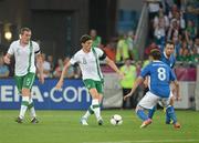 18 June 2012; Keith Andrews, Republic of Ireland, in action against Claudio Marchisio, Italy. EURO2012, Group C, Republic of Ireland v Italy, Municipal Stadium Poznan, Poznan, Poland. Picture credit: Brendan Moran / SPORTSFILE