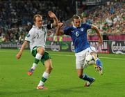 18 June 2012; Federico Balzaretti, Italy, in action against Aiden McGeady, Republic of Ireland. EURO2012, Group C, Republic of Ireland v Italy, Municipal Stadium Poznan, Poznan, Poland. Picture credit: David Maher / SPORTSFILE