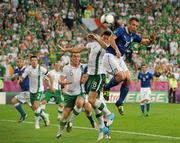 18 June 2012; Antonio Cassano, Italy, heads to score his side's first goal in the thirtyfifth minute, despite the efforts of Keith Andrews, Republic of Ireland. EURO2012, Group C, Republic of Ireland v Italy, Municipal Stadium Poznan, Poznan, Poland. Picture credit: David Maher / SPORTSFILE