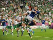 18 June 2012; Antonio Cassano, Italy, heads to score his side's first goal in the thirtyfifth minute, despite the efforts of Keith Andrews, Republic of Ireland. EURO2012, Group C, Republic of Ireland v Italy, Municipal Stadium Poznan, Poznan, Poland. Picture credit: David Maher / SPORTSFILE