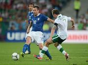 18 June 2012; Antonio Cassano, Italy, in action against Aiden McGeady, Republic of Ireland. EURO2012, Group C, Republic of Ireland v Italy, Municipal Stadium Poznan, Poznan, Poland. Picture credit: David Maher / SPORTSFILE