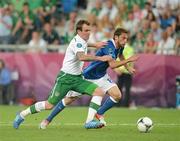 18 June 2012; Glenn Whelan, Republic of Ireland, in action against Claudio Marchisio, Italy. EURO2012, Group C, Republic of Ireland v Italy, Municipal Stadium Poznan, Poznan, Poland. Picture credit: Brendan Moran / SPORTSFILE