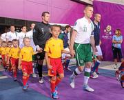 18 June 2012; Republic of Ireland captain Damien Duff leads out his side for the start of the game, on his 100th international appearance. EURO2012, Group C, Republic of Ireland v Italy, Municipal Stadium Poznan, Poznan, Poland. Picture credit: Pat Murphy / SPORTSFILE