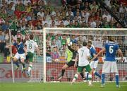 18 June 2012; Antonio Cassano, 10, Italy, heads to score his side's first goal in the thirtyfifth minute, despite the efforts of Keith Andrews, Republic of Ireland. EURO2012, Group C, Republic of Ireland v Italy, Municipal Stadium Poznan, Poznan, Poland. Picture credit: Brendan Moran / SPORTSFILE