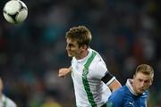 18 June 2012; Kevin Doyle, Republic of Ireland, in action against Ignazio Abate, Italy. EURO2012, Group C, Republic of Ireland v Italy, Municipal Stadium Poznan, Poznan, Poland. Picture credit: David Maher / SPORTSFILE