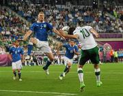 18 June 2012; Robbie Keane, Republic of Ireland, in action against Ignazio Abate, Italy. EURO2012, Group C, Republic of Ireland v Italy, Municipal Stadium Poznan, Poznan, Poland. Picture credit: David Maher / SPORTSFILE