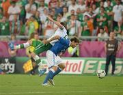 18 June 2012; Alessandro Diamanti, Italy, in action against Glenn Whelan, Republic of Ireland. EURO2012, Group C, Republic of Ireland v Italy, Municipal Stadium Poznan, Poznan, Poland. Picture credit: Brendan Moran / SPORTSFILE