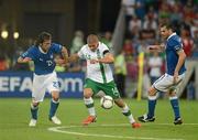 18 June 2012; Jonathan Walters, Republic of Ireland, in action against Andrea Pirlo, left, and Thiago Motta, Italy. EURO2012, Group C, Republic of Ireland v Italy, Municipal Stadium Poznan, Poznan, Poland. Picture credit: Brendan Moran / SPORTSFILE