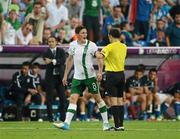 18 June 2012; Keith Andrews, Republic of Ireland, remonstrates with the referee after being issued with a second yellow card, and subsequently sent off. EURO2012, Group C, Republic of Ireland v Italy, Municipal Stadium Poznan, Poznan, Poland. Picture credit: David Maher / SPORTSFILE
