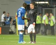 18 June 2012; Shay Given, Republic of Ireland, speaks with goalscorer Mario Balotelli, Italy, after the game. EURO2012, Group C, Republic of Ireland v Italy, Municipal Stadium Poznan, Poznan, Poland. Picture credit: Brendan Moran / SPORTSFILE